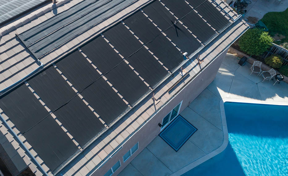 Thermal Solar Panels Installed on the Roof of a Large House.